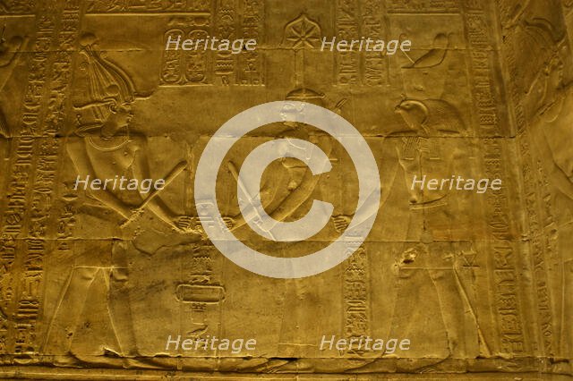 Relief of the Pharaoh with Seshat and Horus, Temple of Edfu, Egypt, Ptolemaic period, (2003). Creator: LTL.