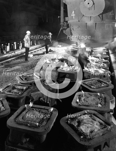 Pig casting at the Park Gate Iron & Steel Co, Rotherham, South Yorkshire, 1964. Artist: Michael Walters