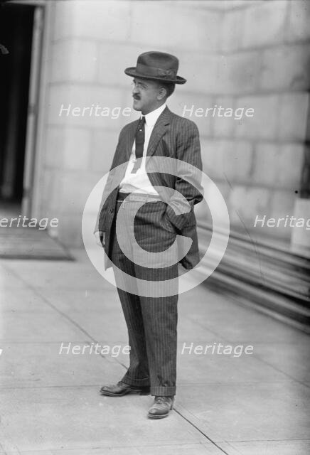 Monorail Subway, Capitol To Senate - Man Who Installed System, 1912. Creator: Harris & Ewing.
