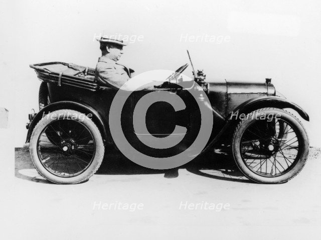Sir Herbert Austin in an Austin Seven, 1922. Artist: Unknown