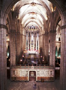 Inside of the Barcelona Cathedral, detail of the main altar and choir of the 13th. Century.