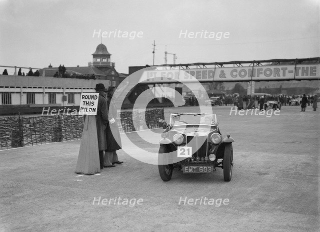 MG TA competing in the JCC Rally, Brooklands, Surrey, 1939. Artist: Bill Brunell.