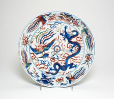 Dish with Dragons and Phoenixes, Ming dynasty, Wanli period, with overglaze enamels added later. Creator: Unknown.