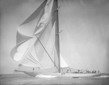 Spinnaker flying on unknown yacht. Creator: Kirk & Sons of Cowes.