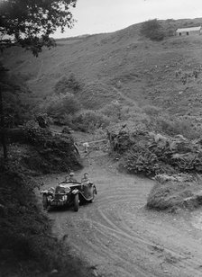 1935 AC tourer taking part in a motoring trial, late 1930s. Artist: Bill Brunell.