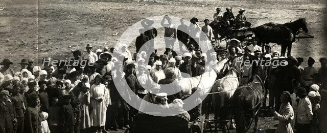 Leon Trotsky underway at a village, 1924.