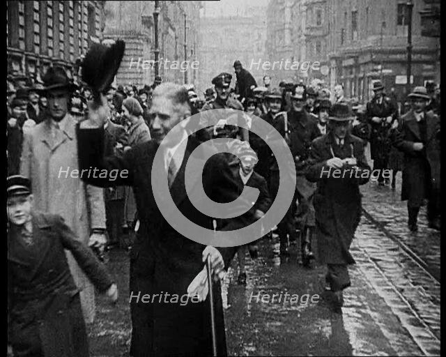 Franz von Papen Walking Towards Camera Surrounded by a Crowd, 1933. Creator: British Pathe Ltd.