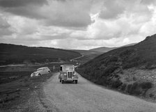 Standard saloon of NAW Brown competing in the RSAC Scottish Rally, 1936. Artist: Bill Brunell.