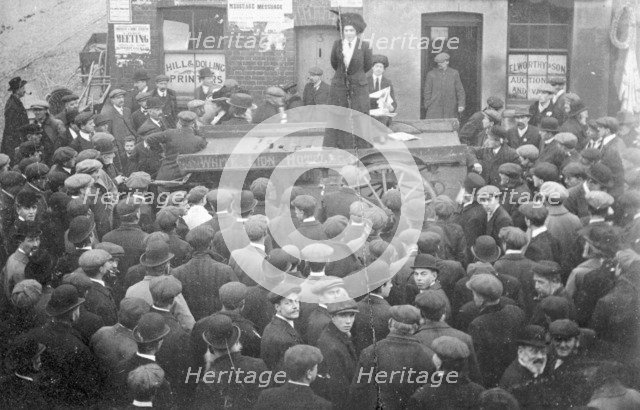Isabel Seymour addressing a crowd of men and boys from a tradesman's cart, 1908. Artist: Unknown