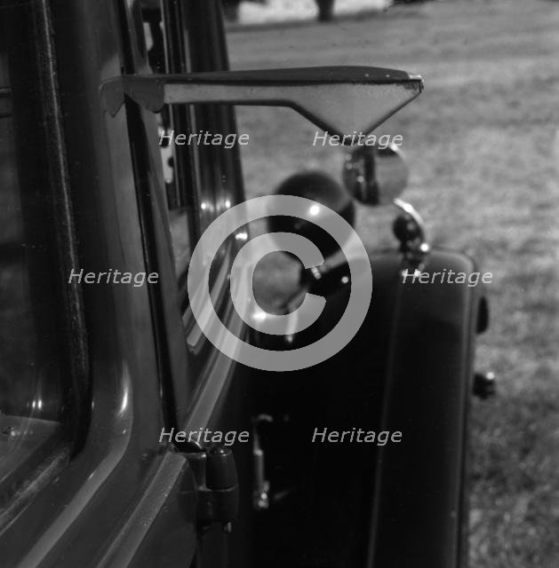 Semaphore indicator arm on 1937 Morris 8 series II. Creator: Unknown.