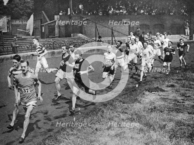 Running the half mile at the Civil Service Sports day, Stamford Bridge, London, 1926-1927. Artist: Unknown