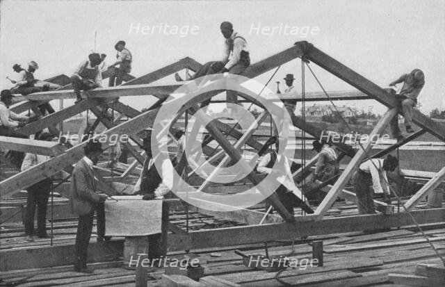 Students framing the roof of a large building, 1904. Creator: Frances Benjamin Johnston.