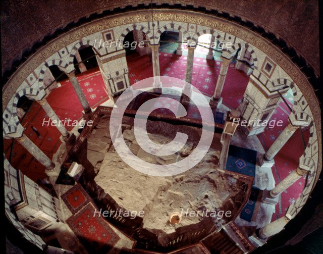 Inside the Dome of the Rock, where you can see the Rock of Abraham.