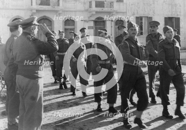 March-past by members of the Jewish Brigade, Tripoli, Libya, 30 January 1943. Artist: Unknown