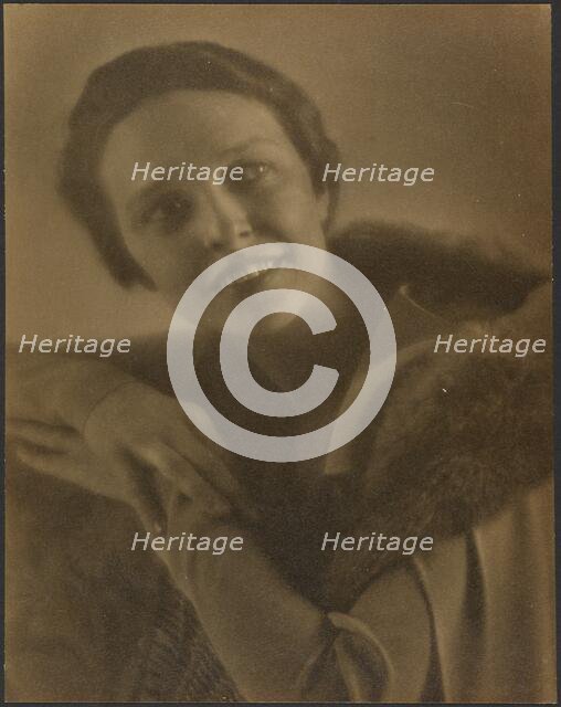 Portrait of a Woman Leaning on Chair, 1907-1943. Creator: Louis Fleckenstein.