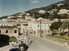 View down the main street from the Grand Hotel, Charlotte Amalie, St. Thomas Island, V.I., 1941. Creator: Jack Delano.
