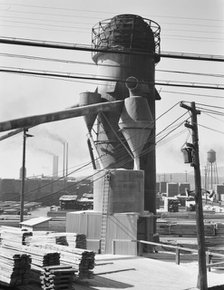 Possibly: Lumber burner and stacks of the Big Lakes Lumber Company..., Klamath Falls, Oregon, 1939. Creator: Dorothea Lange.