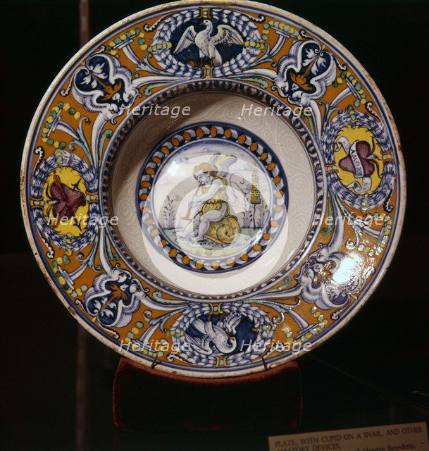 Cupid on a Snail blowing a trumpet, plate from Siena, Italy, 1510. Artist: Unknown.