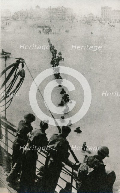 Allied troops wait for a ship during the Dunkirk evacuation, 1940. Artist: Unknown