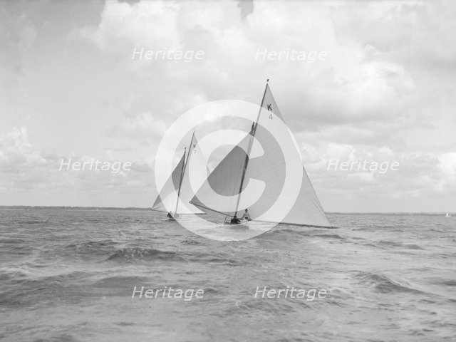 The 7 Metre class 'Anitra' (K4) and 'Ginevra' (K7) race downwind, 1912. Creator: Kirk & Sons of Cowes.