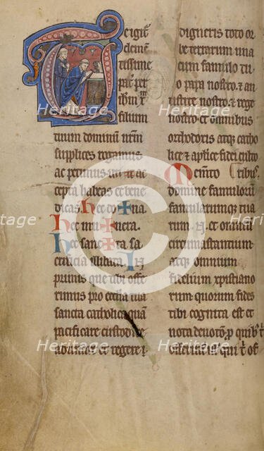 Initial T: A Priest Celebrating Mass; Missal, begun after 1234-completed before 1262. Creator: Unknown.