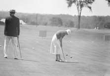 Cassidy, Ellen, Mrs., playing golf, 1932 July. Creator: Arnold Genthe.