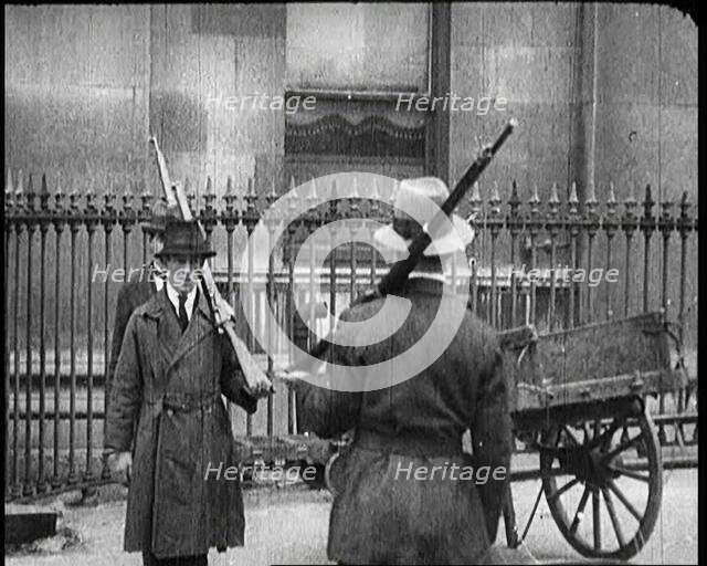 Irish Free State Soldiers With Their Rifles on Their Shoulders, 1922. Creator: British Pathe Ltd.