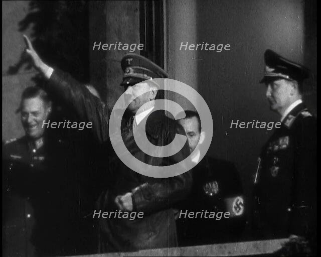 Adolf Hitler, the German Leader, Saluting the Crowd with Hermann Goering and..., 1937. Creator: British Pathe Ltd.