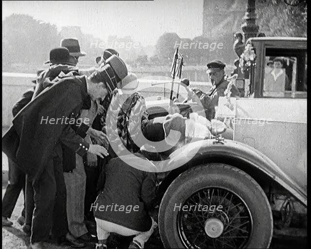 Scene from the Film 'The Compulsory Husband': The Actor Monty Banks  Causes an Accident..., 1920s. Creator: British Pathe Ltd.