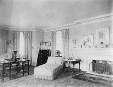 Bedroom with fireplace, and padded chaise longue, in home of...Greenwich, Connecticut, 1908. Creator: Frances Benjamin Johnston.