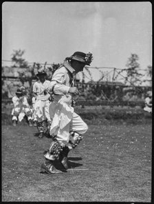 Bampton Morris troupe performing in a 'Pipe Dance', Bampton, West Oxfordshire, Oxfordshire, 1920-30. Creator: George R Long.