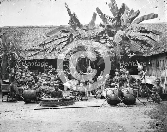Siam (Thailand): a khon (masked dance drama) and lakhon (acting) troupe, 1865. Creator: John Thomson.
