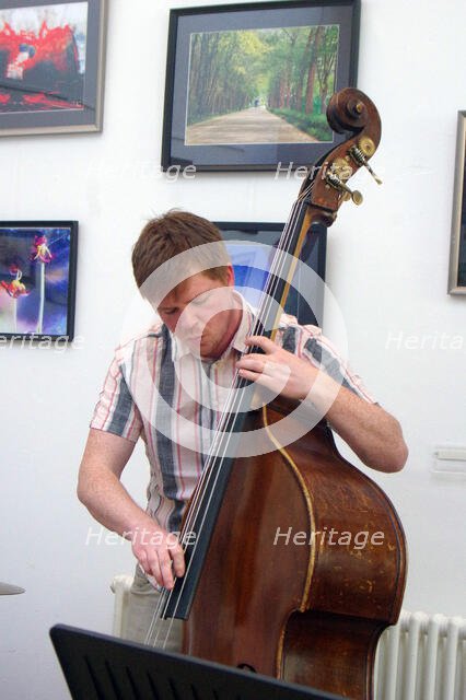 Stuart Barker, Stuart Henderson Quartet, Clocktower Cafe Jazz Club, Croydon, London, April 2025. Creator: Brian O'Connor.