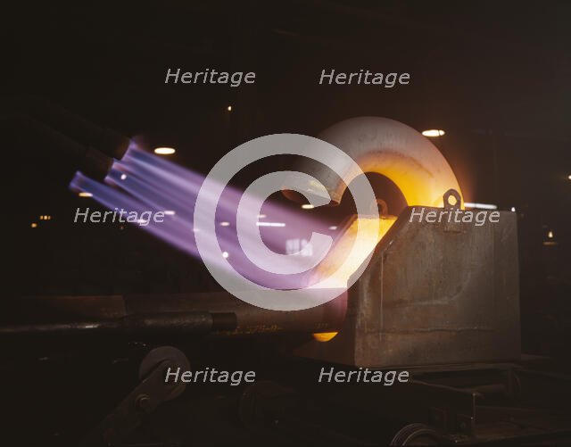 Large pipe elbows for the Army are formed at Tube Turns, Inc., by heating..., Louisville, Ky., 1941. Creator: Alfred T Palmer.