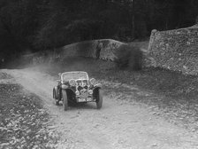 Singer 2-seater sports competing in a motoring trial, Nailsworth Ladder, Gloucestershire, 1930s.. Artist: Bill Brunell.