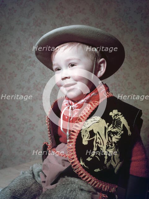 Young boy in a cowboy outfit, c1955.  Creator: Arthur Charles Kirby Ware.