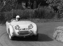 C Wells driving an Austin Healey Frogeye Sprite at the Wiscombe Park Hill, Climb, Devon, 1961. Creator: Unknown.