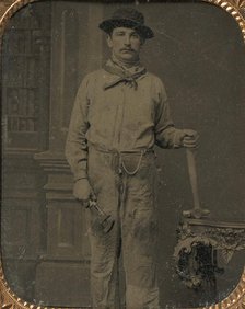 Workman Holding a Wrench and Hammer, 1860s. Creator: Unknown.