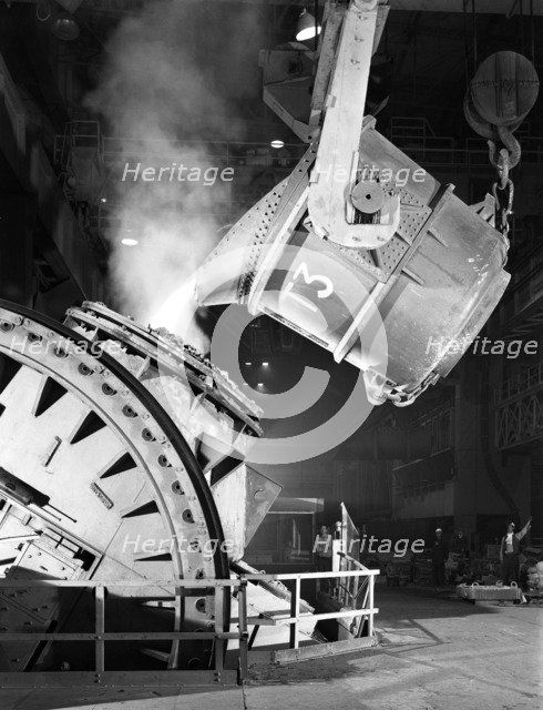 Pouring iron into a Kaldo unit, Park Gate Iron and Steel Co, Rotherham, South Yorkshire, 1964. Artist: Michael Walters