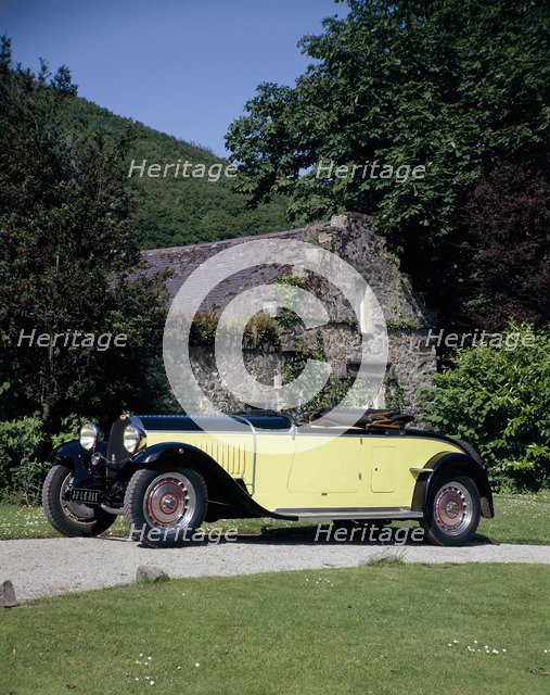 A 1934 Bugatti Type 46 outside a cottage. Artist: Unknown