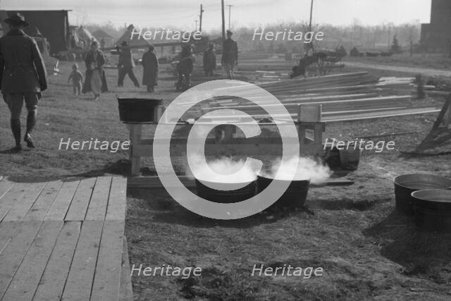 Possibly: The kitchen in the camp for white flood refugees at Forrest City, Arkansas, 1937. Creator: Walker Evans.