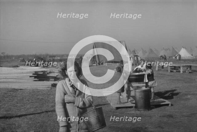Possibly: Facilities for washing in the camp for white flood...at Forrest City, Arkansas, 1937. Creator: Walker Evans.