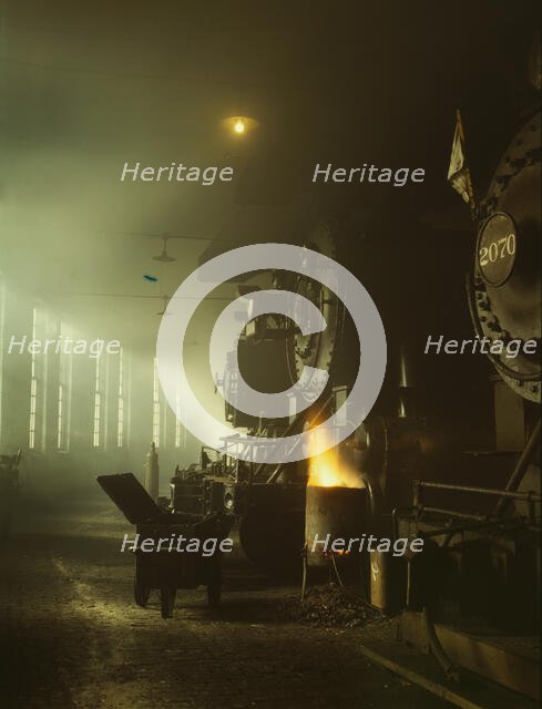 C & NW RR locomotives in the roundhouse at Proviso yard, Chicago, Ill., 1942. Creator: Jack Delano.