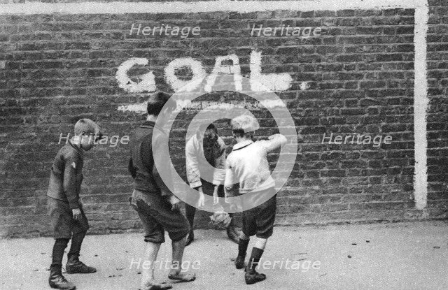 Football in the East End, London, 1926-1927. Artist: Unknown