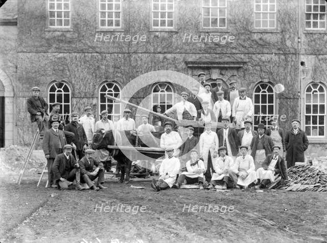 Workmen posing outside a house with a bullock cart, Kingston Lisle, Oxfordshire, c1860-c1922. Artist: Henry Taunt