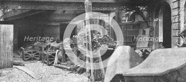 'Nos villes a sac; Cuves et machines d'une fabrique d'huile systematiquement detruites', 1918. Creator: Unknown.