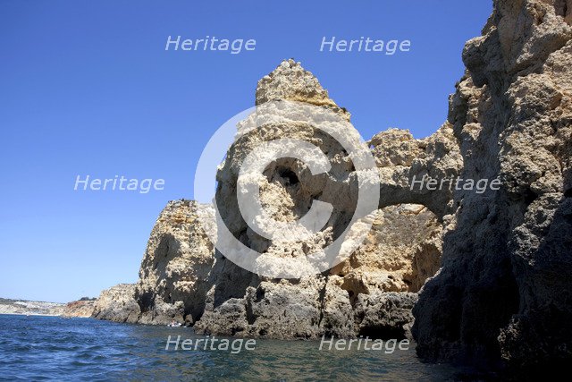 The cliffs at Praia de Dona Ana, Portugal, 2009. Artist: Samuel Magal