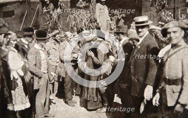A German mother meets her son for the first time for five years, 1919.  Artist: Central Photographic Agency