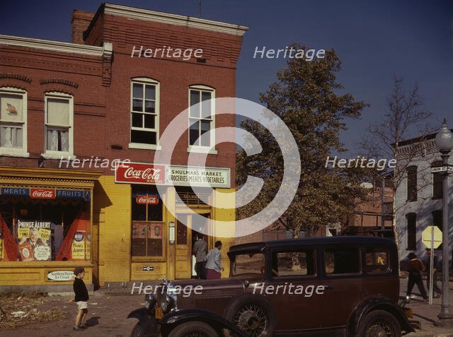 Car in front of Shulman's Market on N at Union St. S.W., Washington, D.C., between 1941 and 1942. Creator: Louise Rosskam.