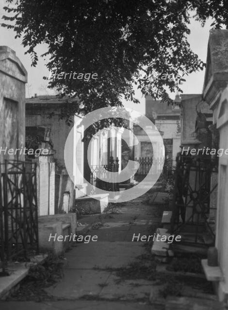 Tombs in St. Louis Cemetery, New Orleans, between 1920 and 1926. Creator: Arnold Genthe.